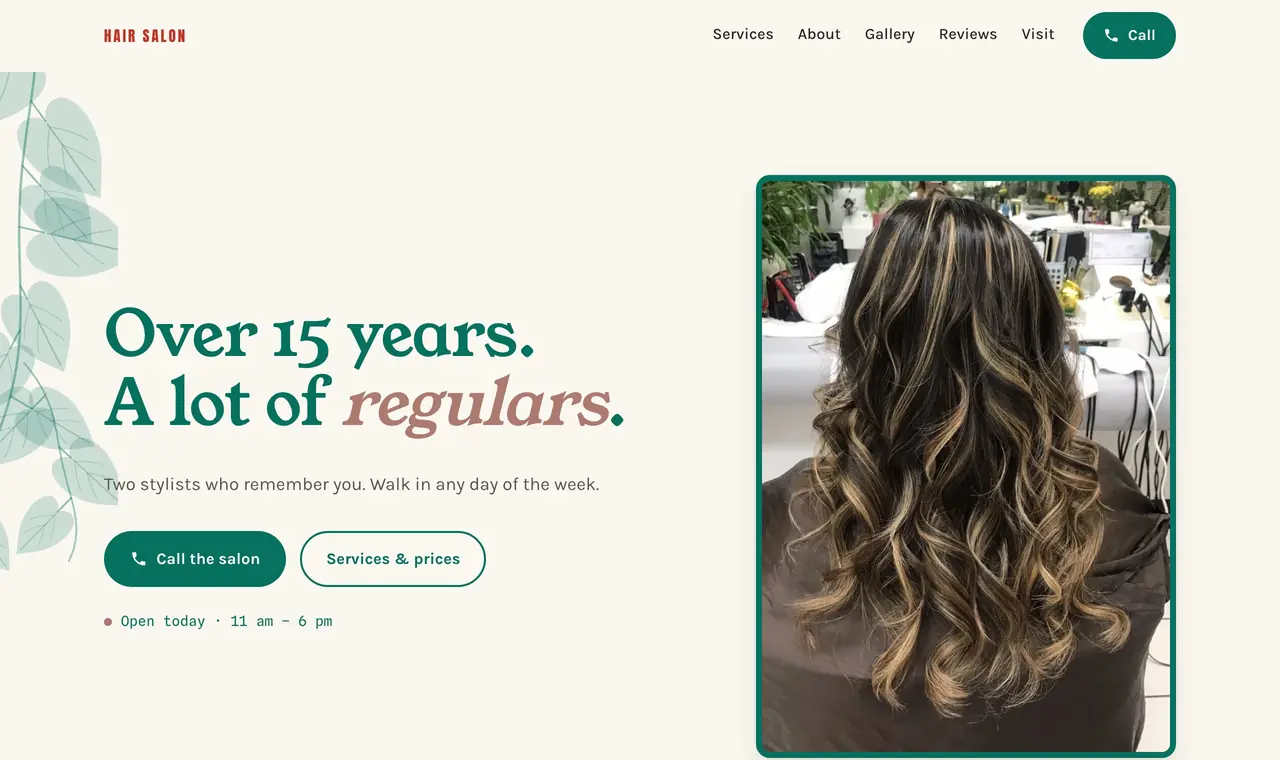 Hair salon homepage with a Call the salon button, today’s hours and a photo of long, curled, highlighted hair.